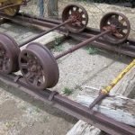 36. Two and one-half sets of railroad wheels and axles.